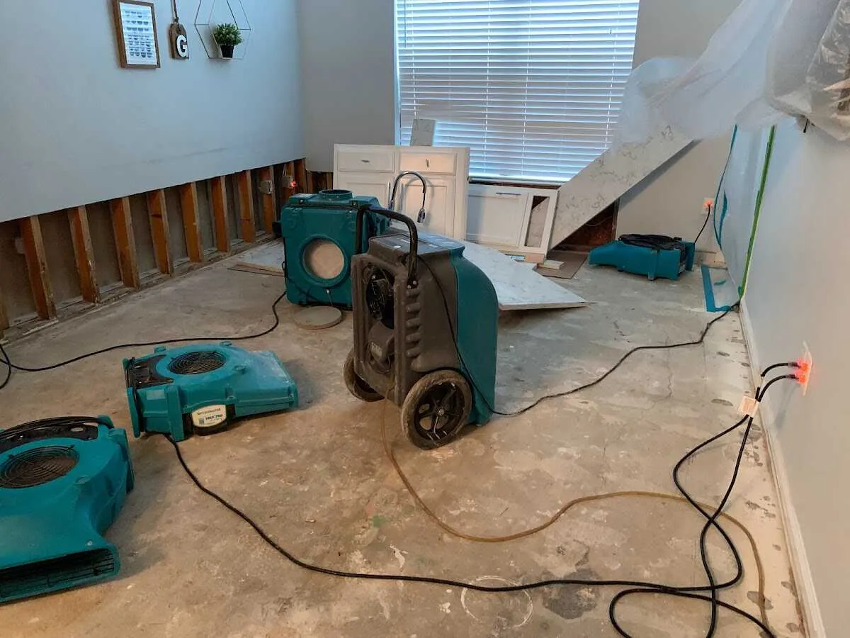 Dehumidifier in flood-cut room for Water Damage Restoration in Webster Groves